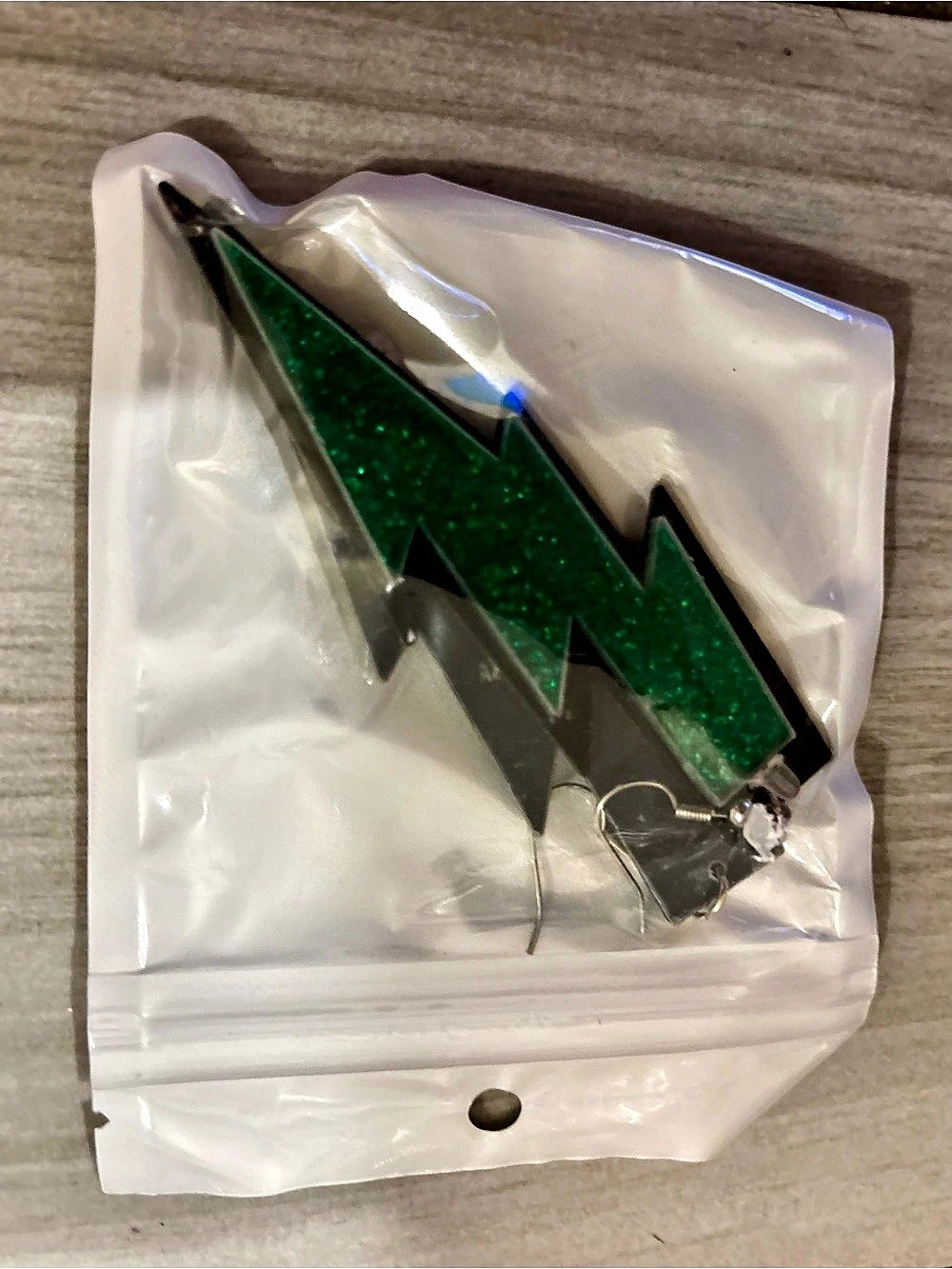 Green Lightning Bolt earring new in bag
